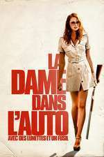 La dame dans l’auto avec un fusil et des lunettes (2015)